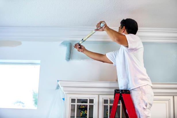  painting walls and ceilings with water-based paint